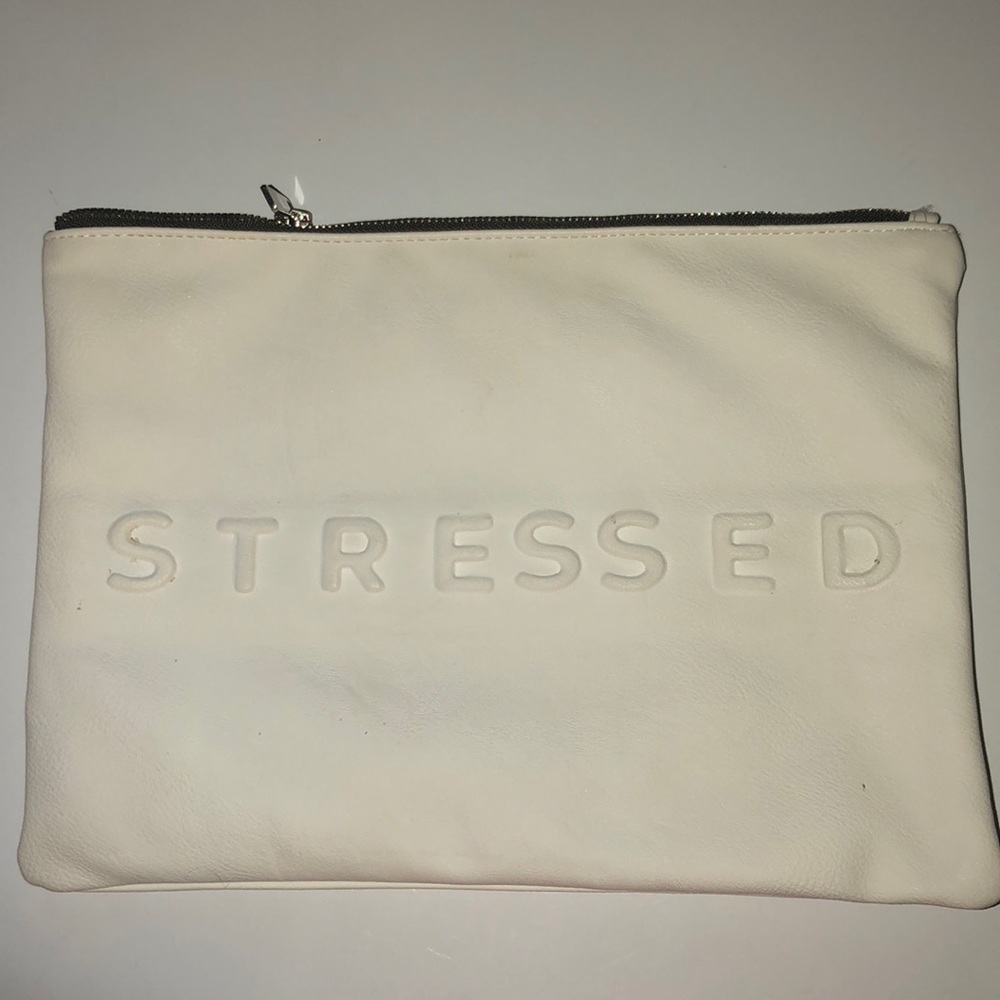 Never worn, chic, stylish and fashionable clutch!